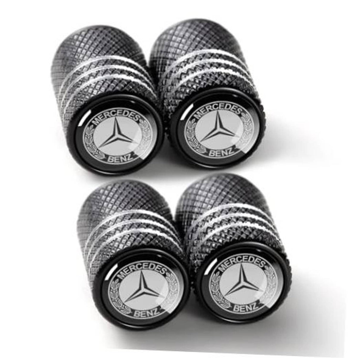 Set of black tire valve stem caps with Mercedes-Benz emblem and textured grip