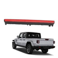 Center high mount third brake light with red lens and black housing