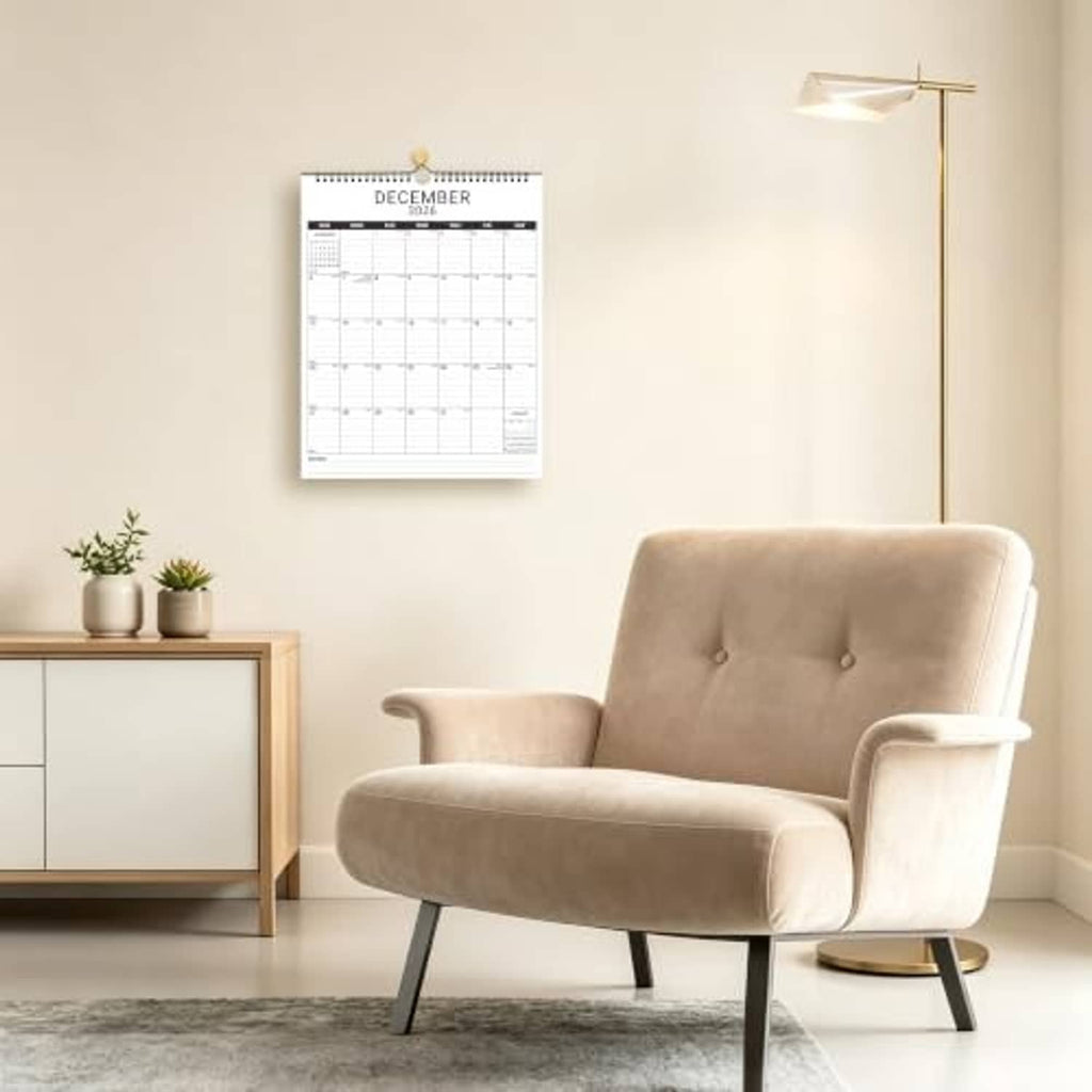 White wall calendar page for December 2026 on a spiral ring