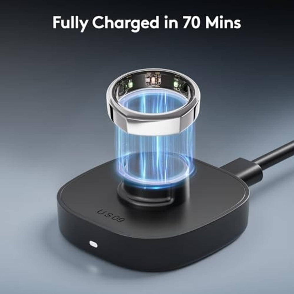 Black smart ring charging dock with glowing ring cradle and USB-A cable