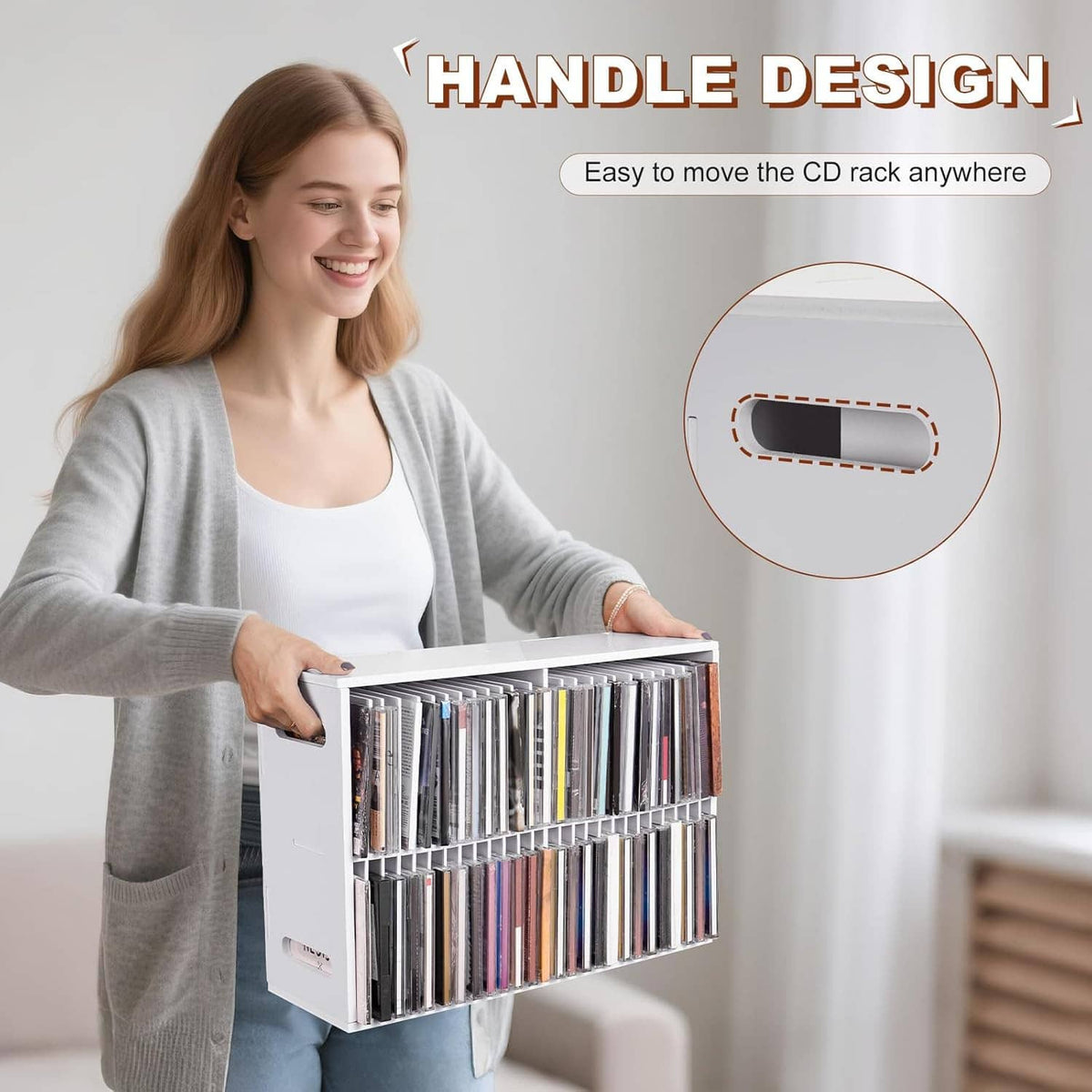 White wall-mounted CD rack being held by a woman, showing two rows of CD cases
