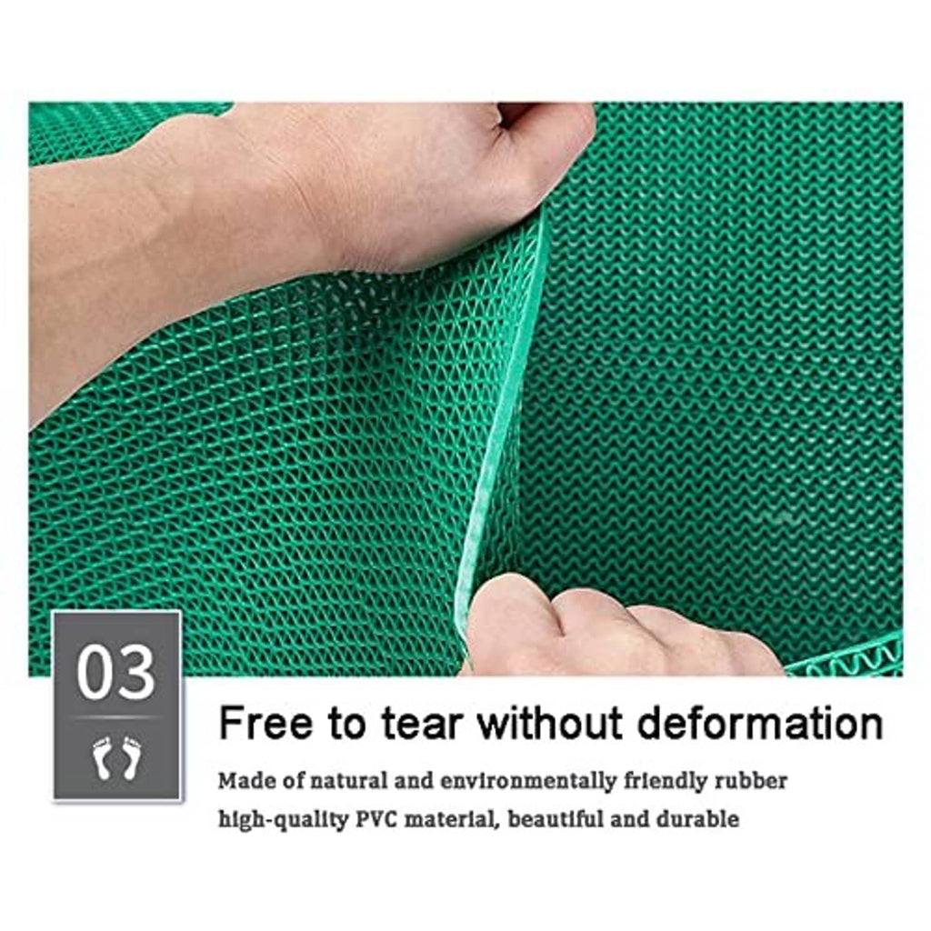 Green PVC drainage mat with flexible raised mesh held in hands