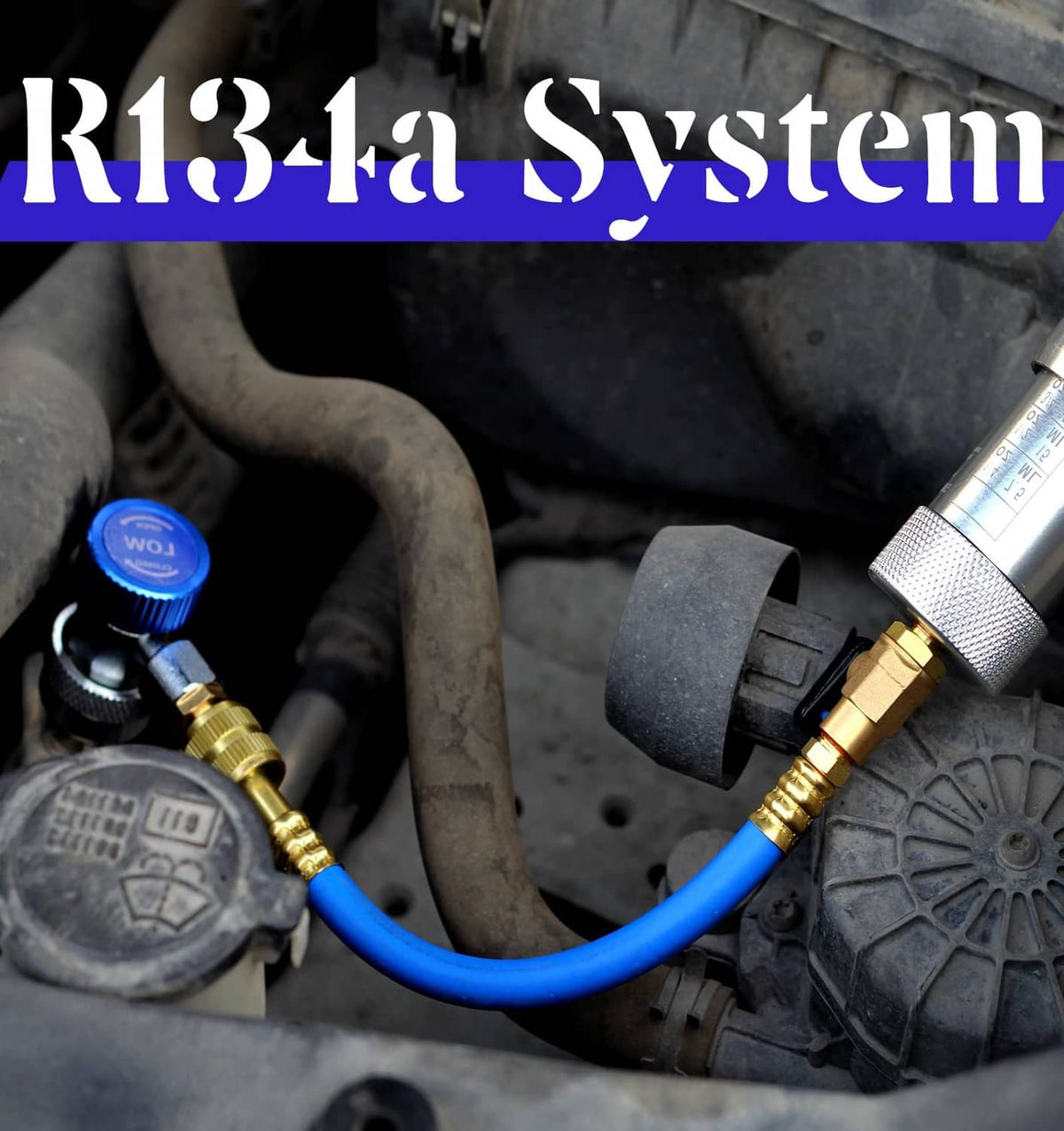 Oil injector fitting with blue hose, brass valve, and metal canister on engine bay