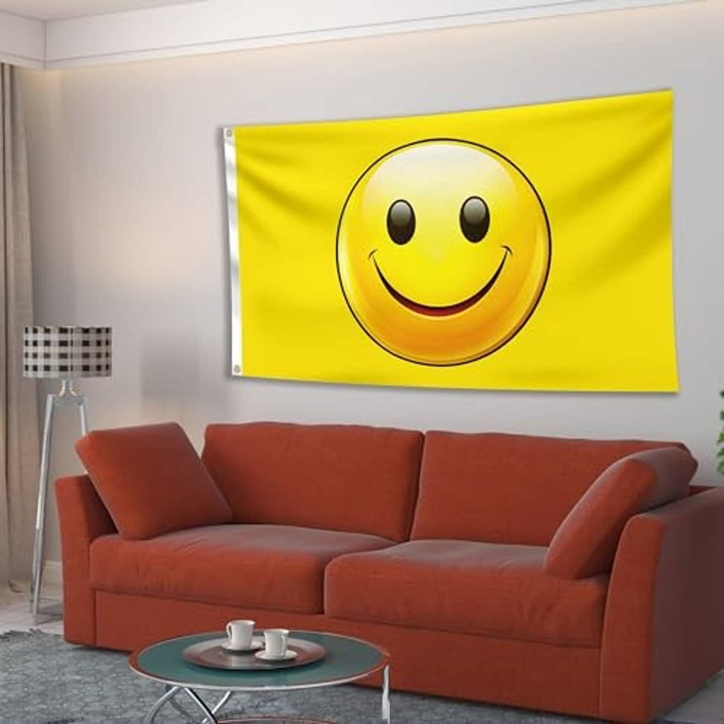 Yellow smiley face flag mounted on a wall above an orange sofa
