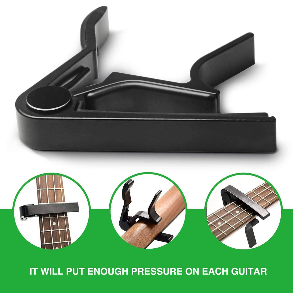 Black guitar capo with base plate, prongs, and top pressure bar