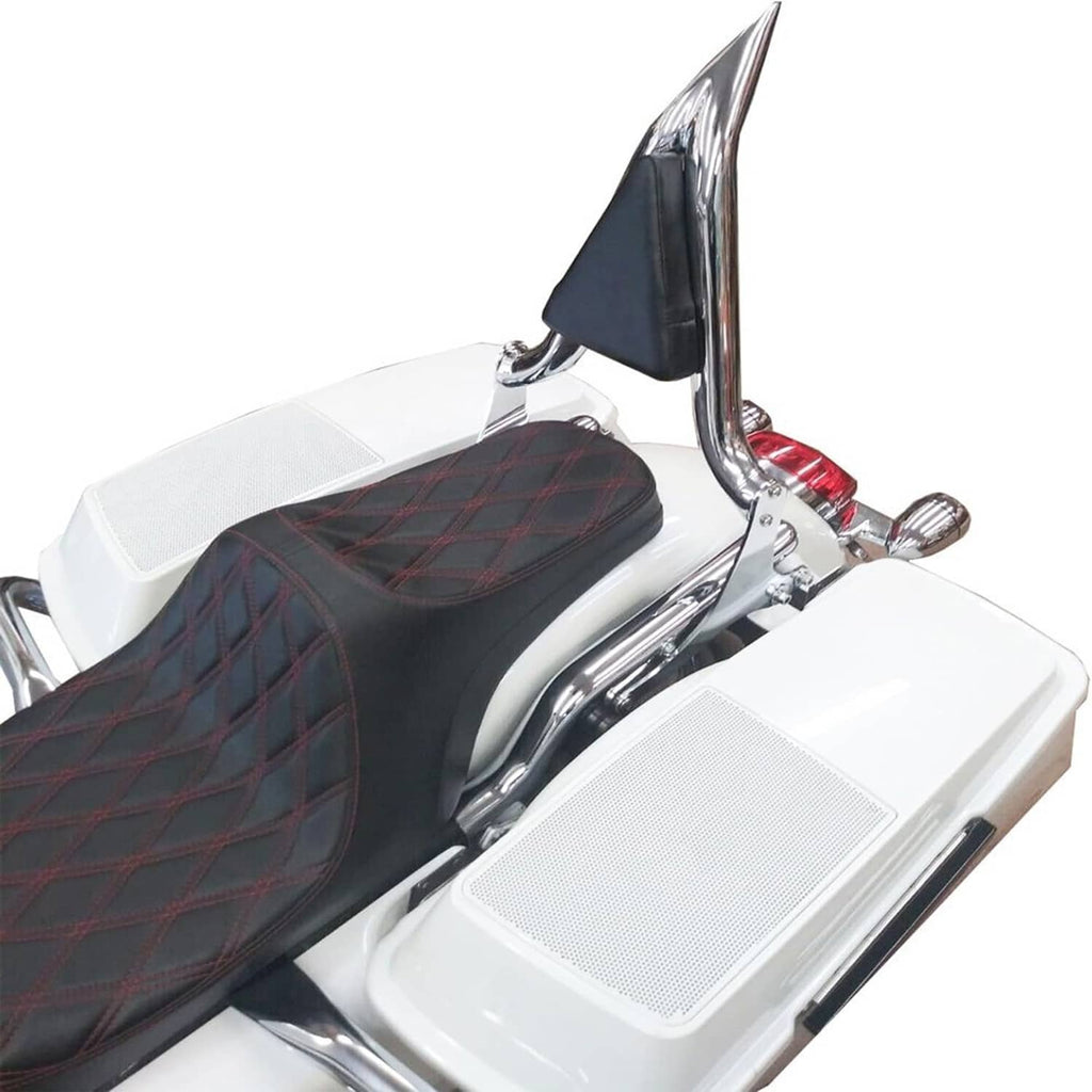 Chrome sissy bar backrest with black pad mounted behind a white motorcycle seat