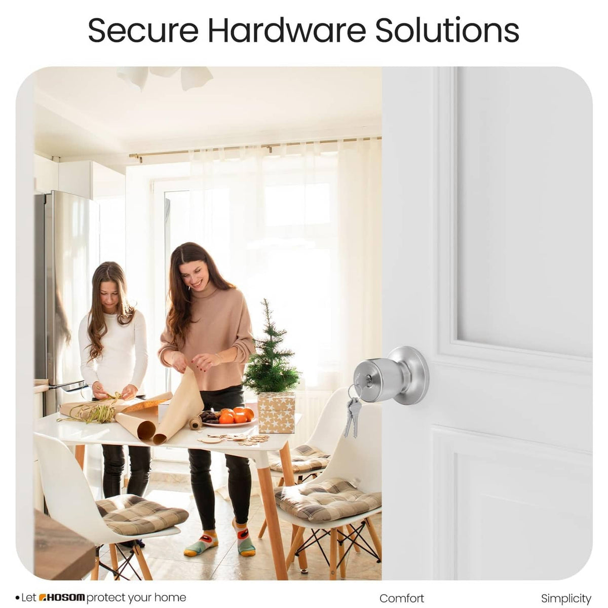 Satin nickel keyed entry door knob lock on front door with key held ready