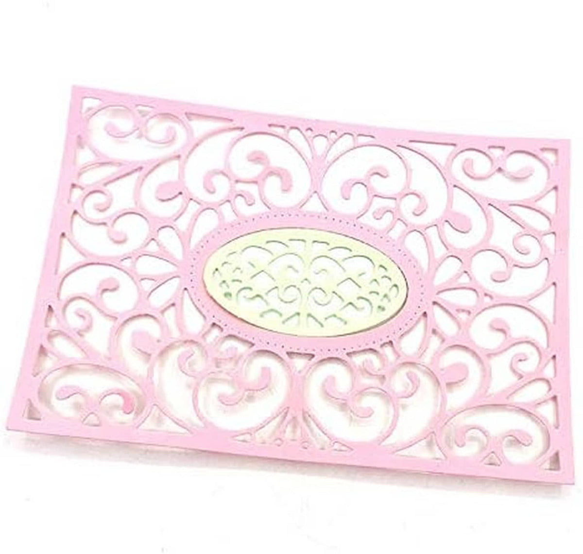 Pink decorative card featuring an oval lace flower frame with ornamental scrolls