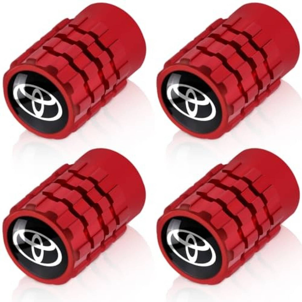 Set of four red tire valve stem caps with Toyota logo emblem and ridged grip