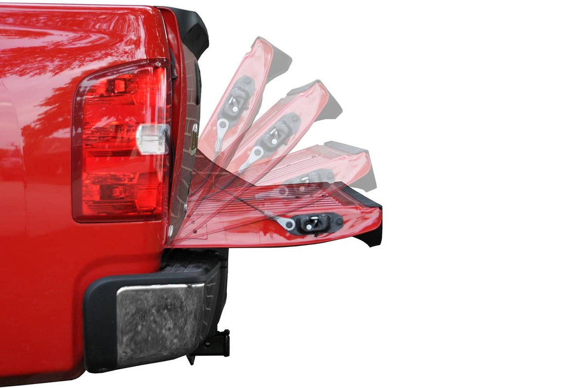 Tailgate assist hardware installed on red pickup tailgate