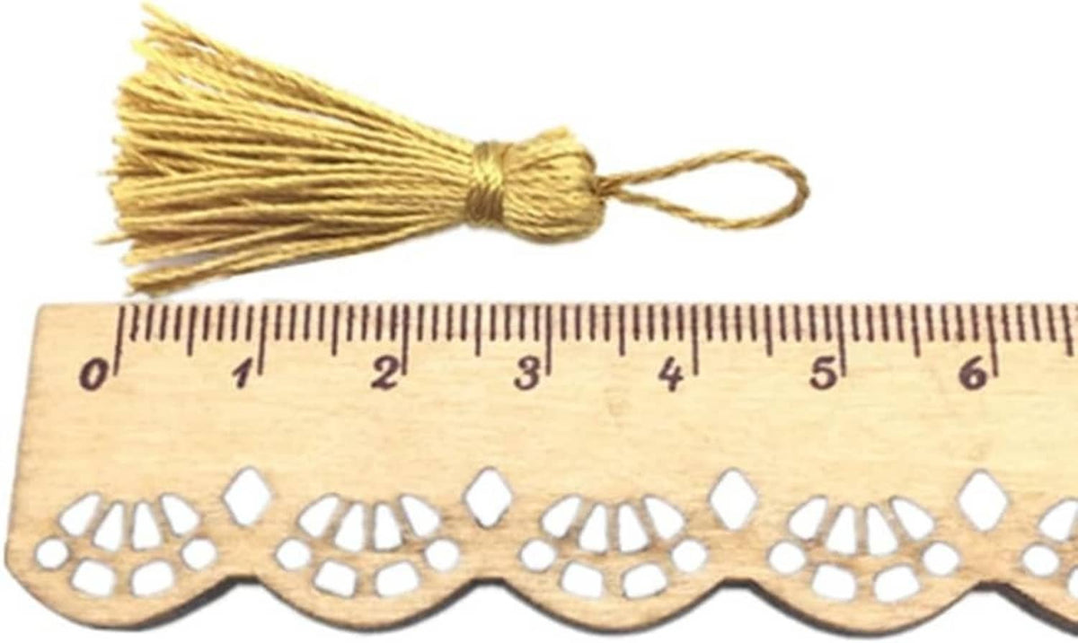 Gold mini craft tassel bundle with short threads and loop, length shown on ruler
