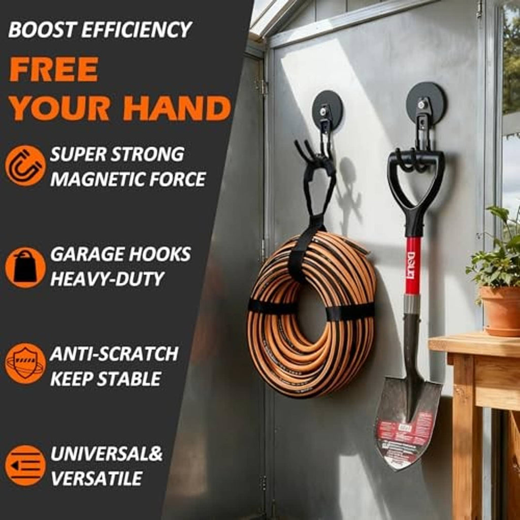 Black magnetic garage hook holding coiled orange hose on a wall