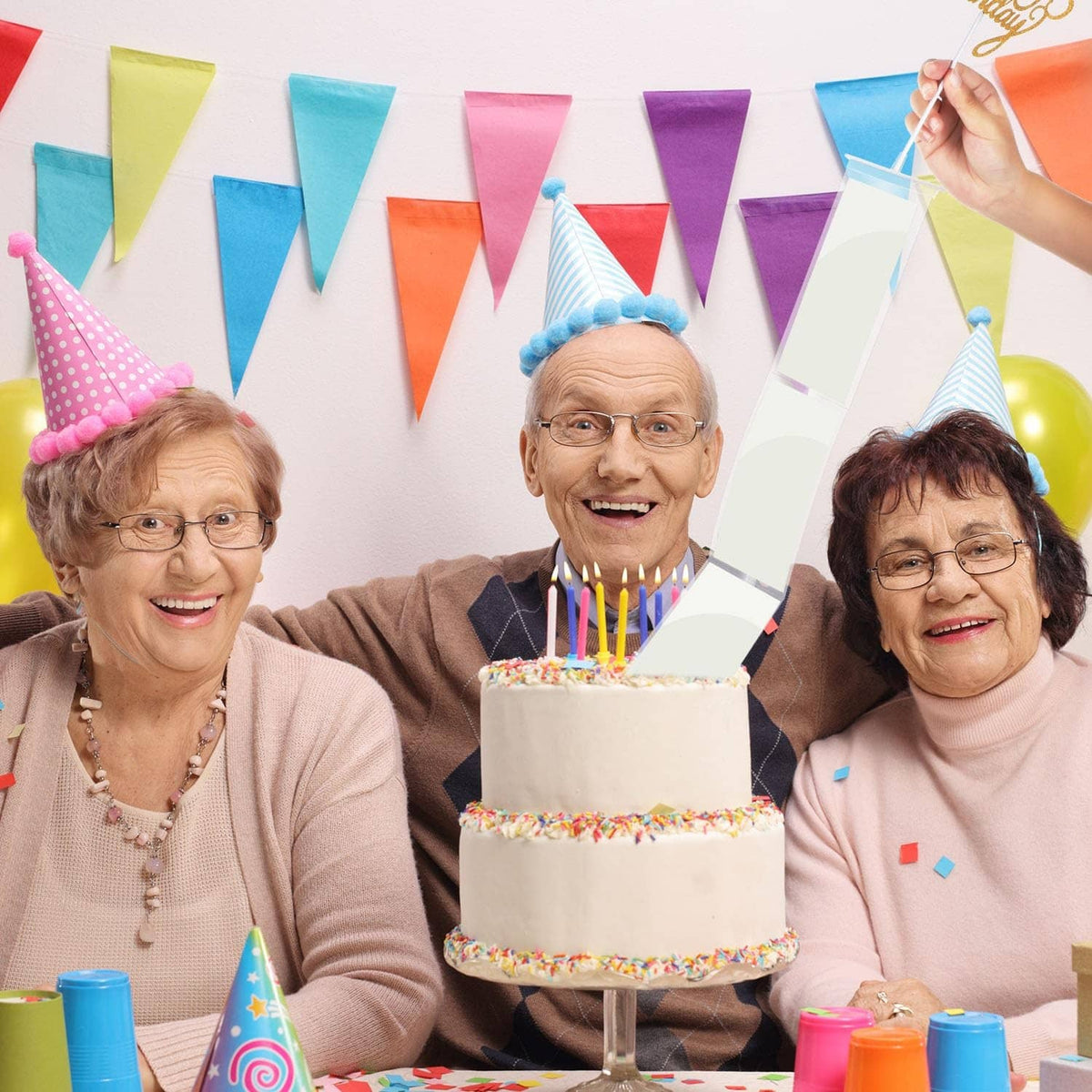 Birthday party cake with candles and money pull-out accessory
