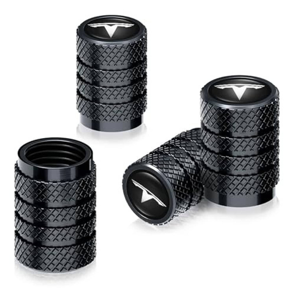 Black tire valve stem caps, textured sides and V-emblem tops with one open cap