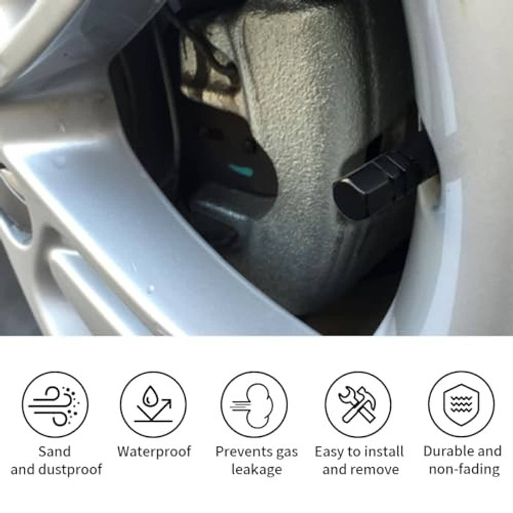 Black hex tire valve cap installed on a car wheel rim.