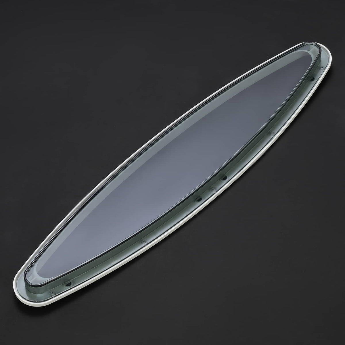 Oval porthole window with silver outer frame and dark tinted glass.