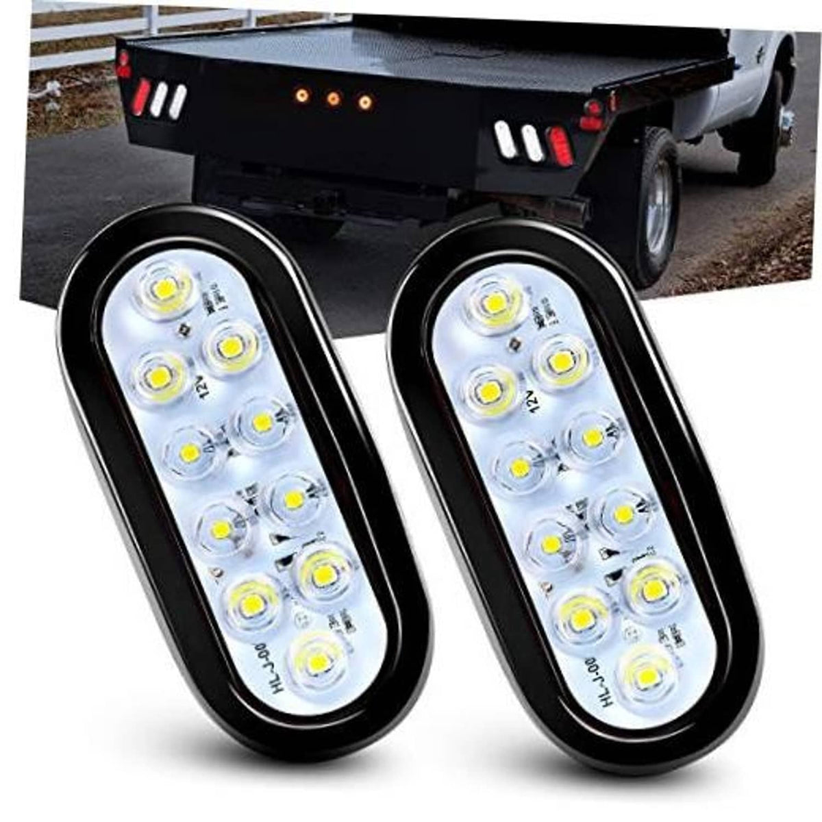 Pair of oval LED trailer tail lights with clear lenses and dark housings