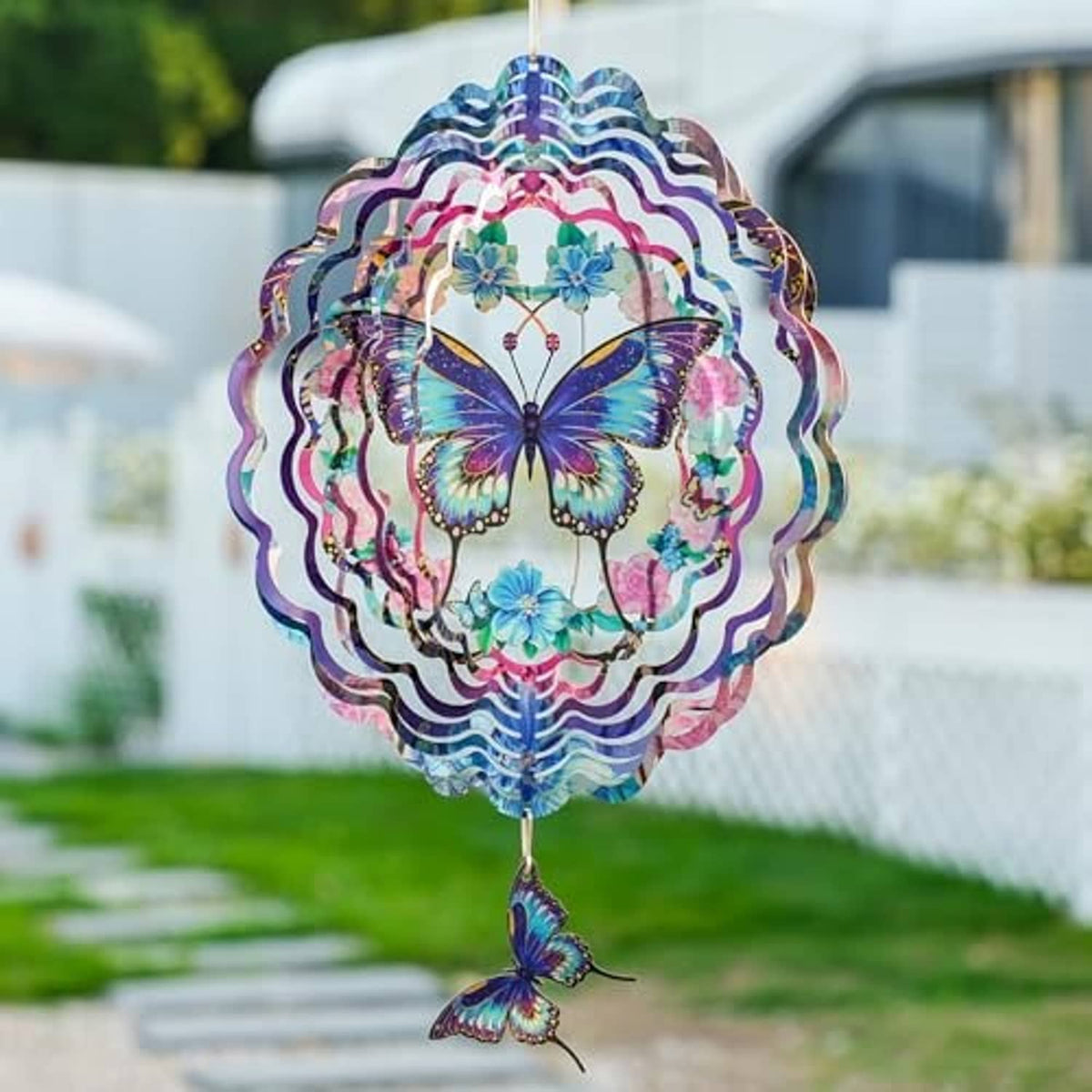 Hanging butterfly wind spinner with central butterfly and small dangling butterfly charm