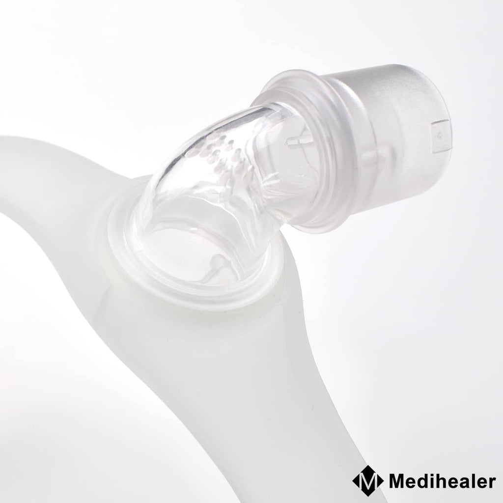 Clear elbow swivel connector attached to a mask interface tubing end