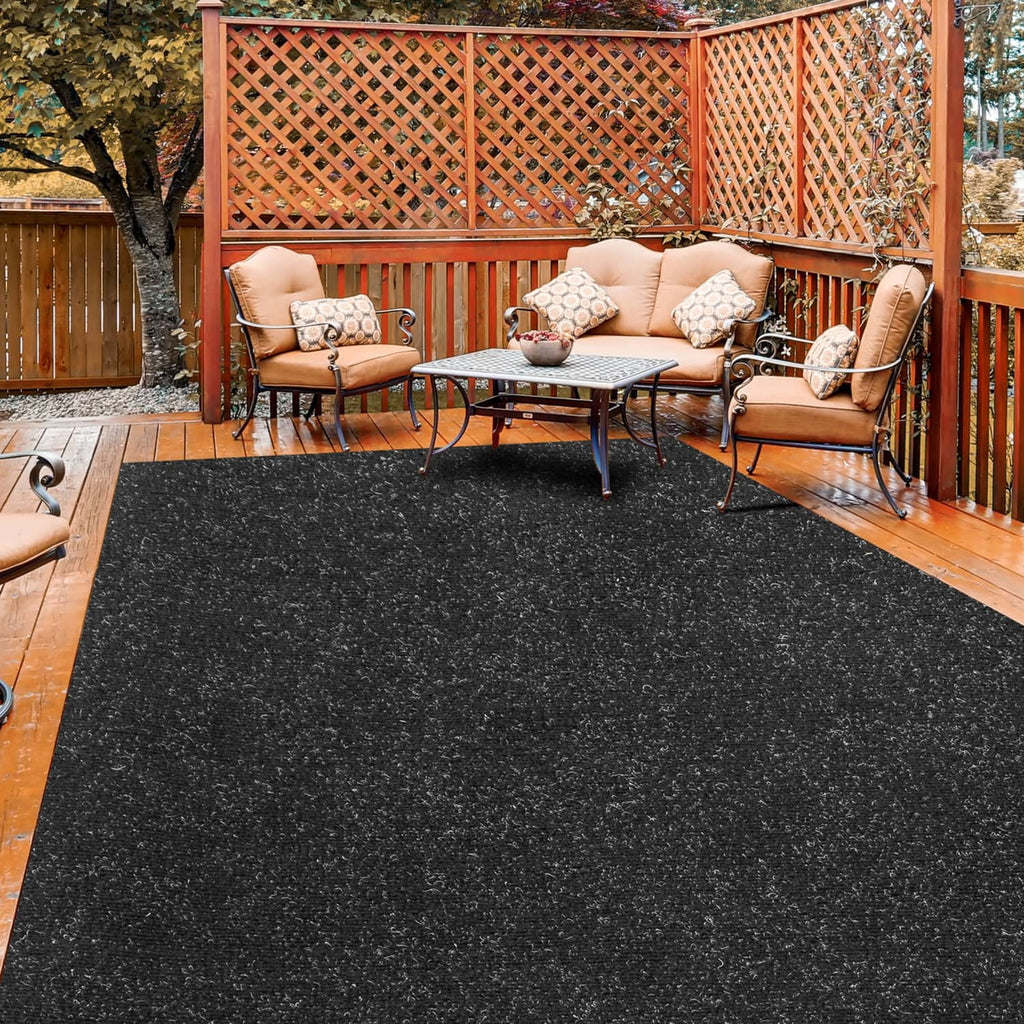 Charcoal black outdoor carpet laid on patio deck