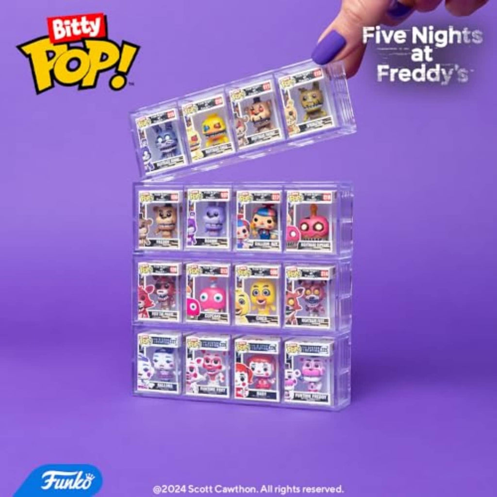 Hand holding a Bitty Pop! card rack of boxed mini figures