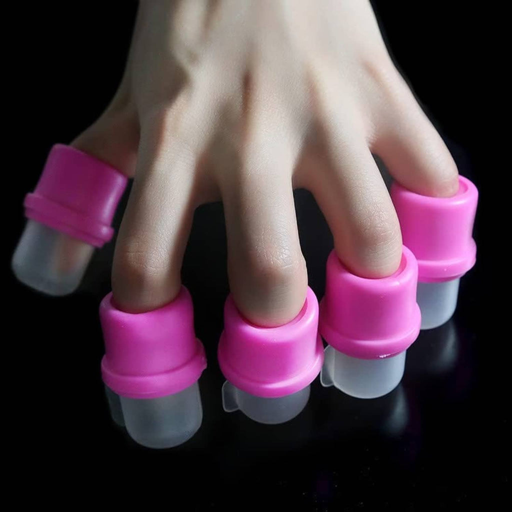 Hand wearing pink-and-clear nail soak soakers on fingers