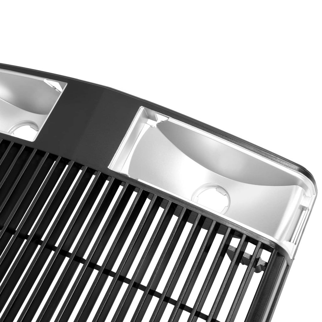 Close-up of tractor grille top rail with silver housing and round opening under black slats