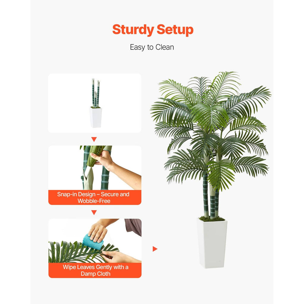 Faux palm tree with green fronds, striped trunks, and white pot for indoor decor