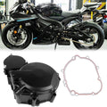 Black motorcycle left engine crankcase cover with attached components and mounting hardware