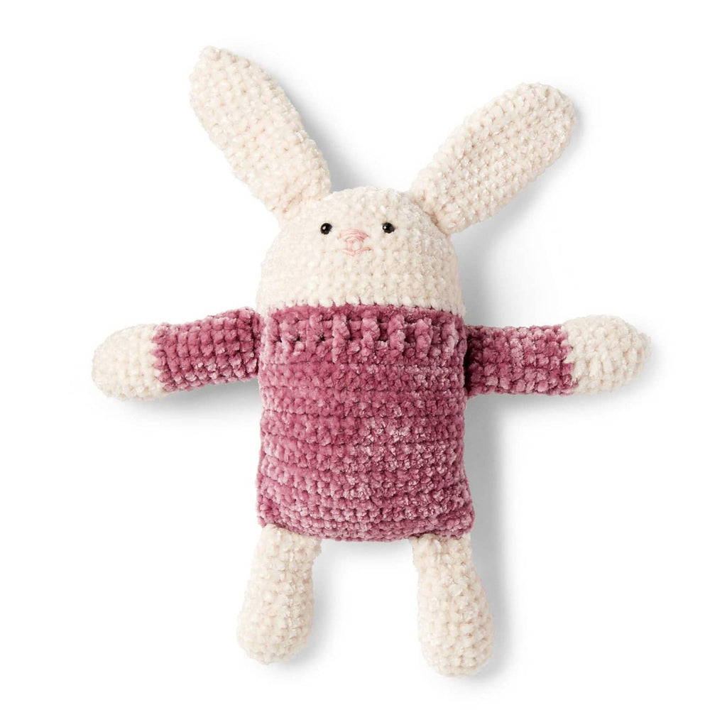 Crocheted bunny plush made with soft textured yarn in lilac and cream