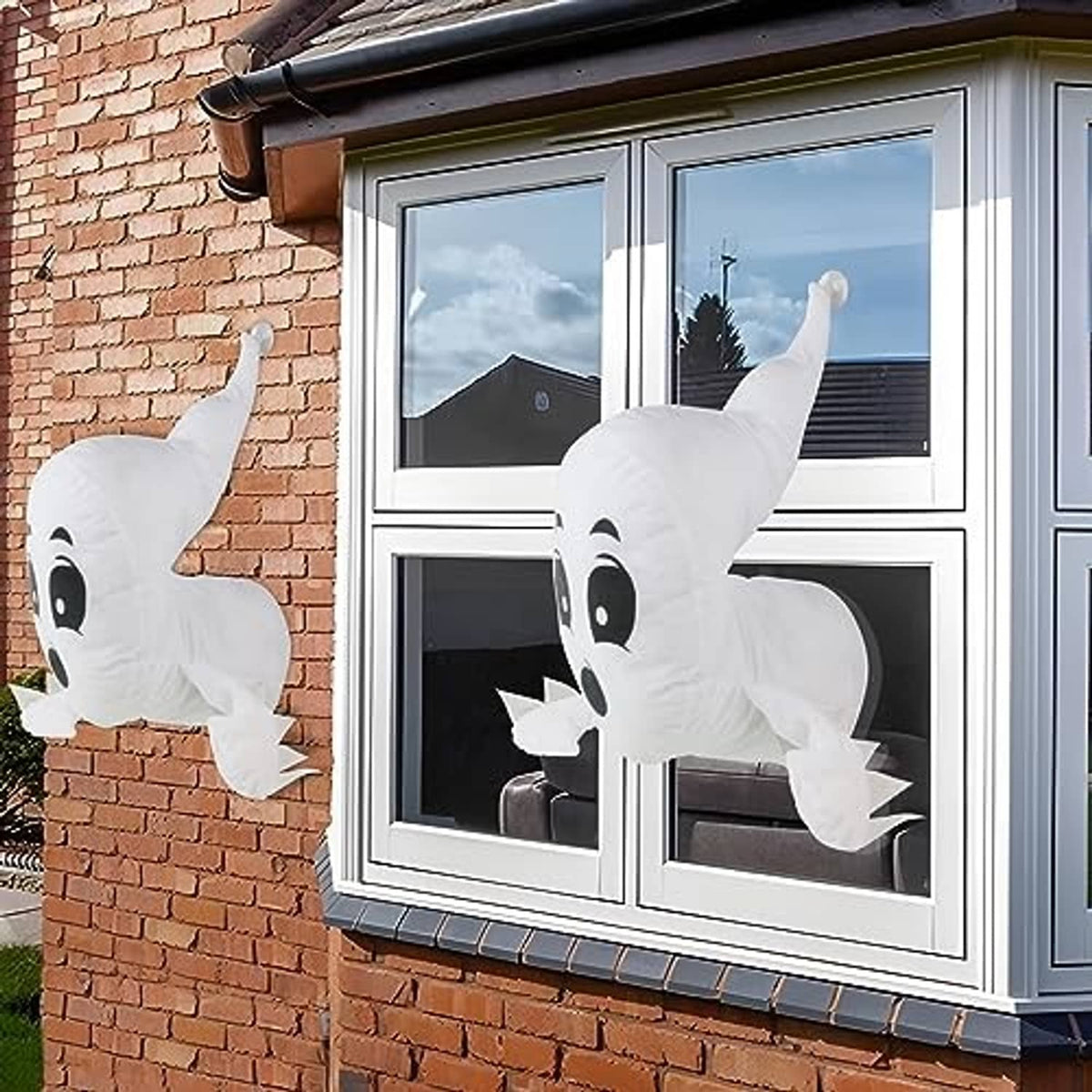 White Halloween stuffed ghost window decorations, two ghosts with long tails and big eyes
