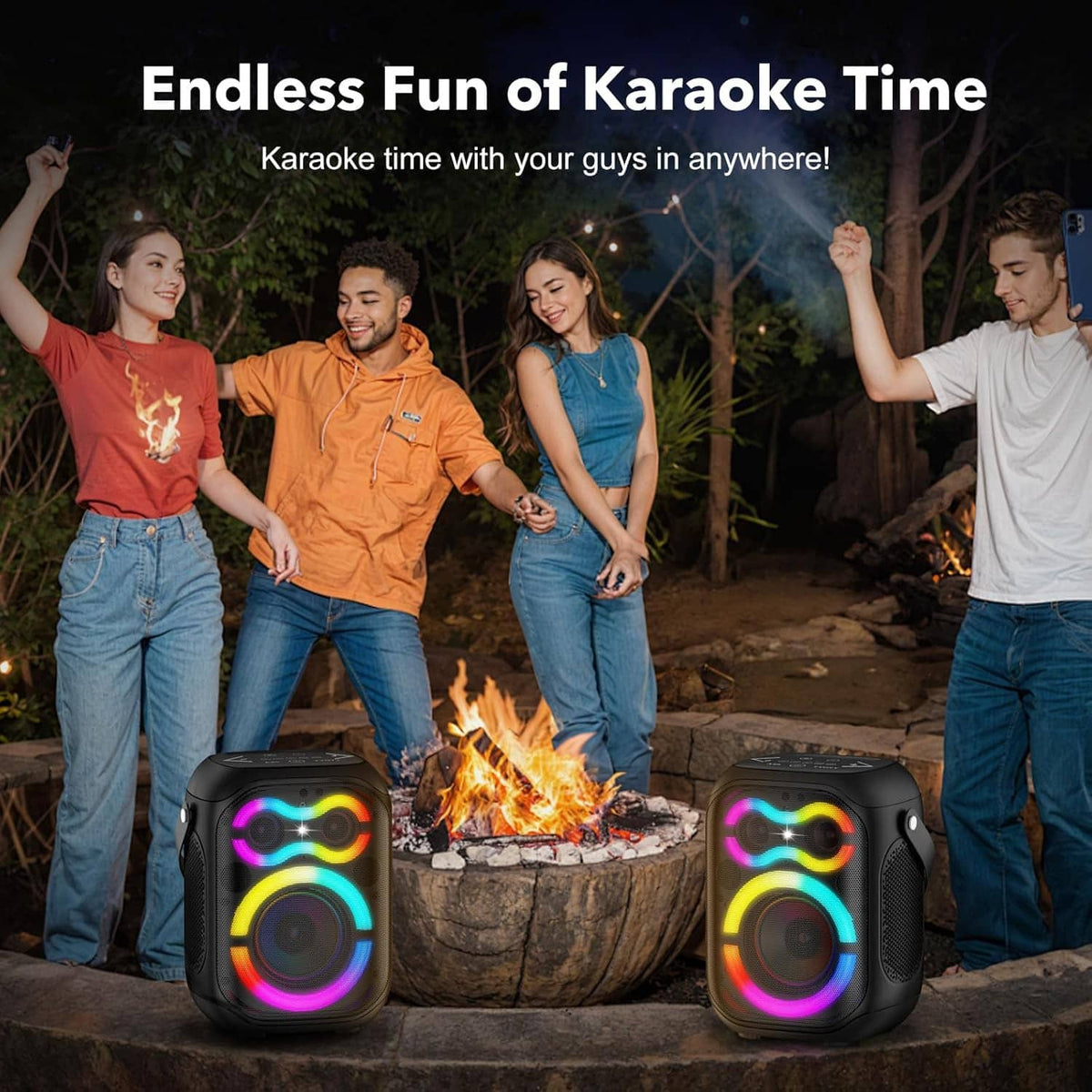 Two portable Bluetooth speakers with RGB lights beside a firepit