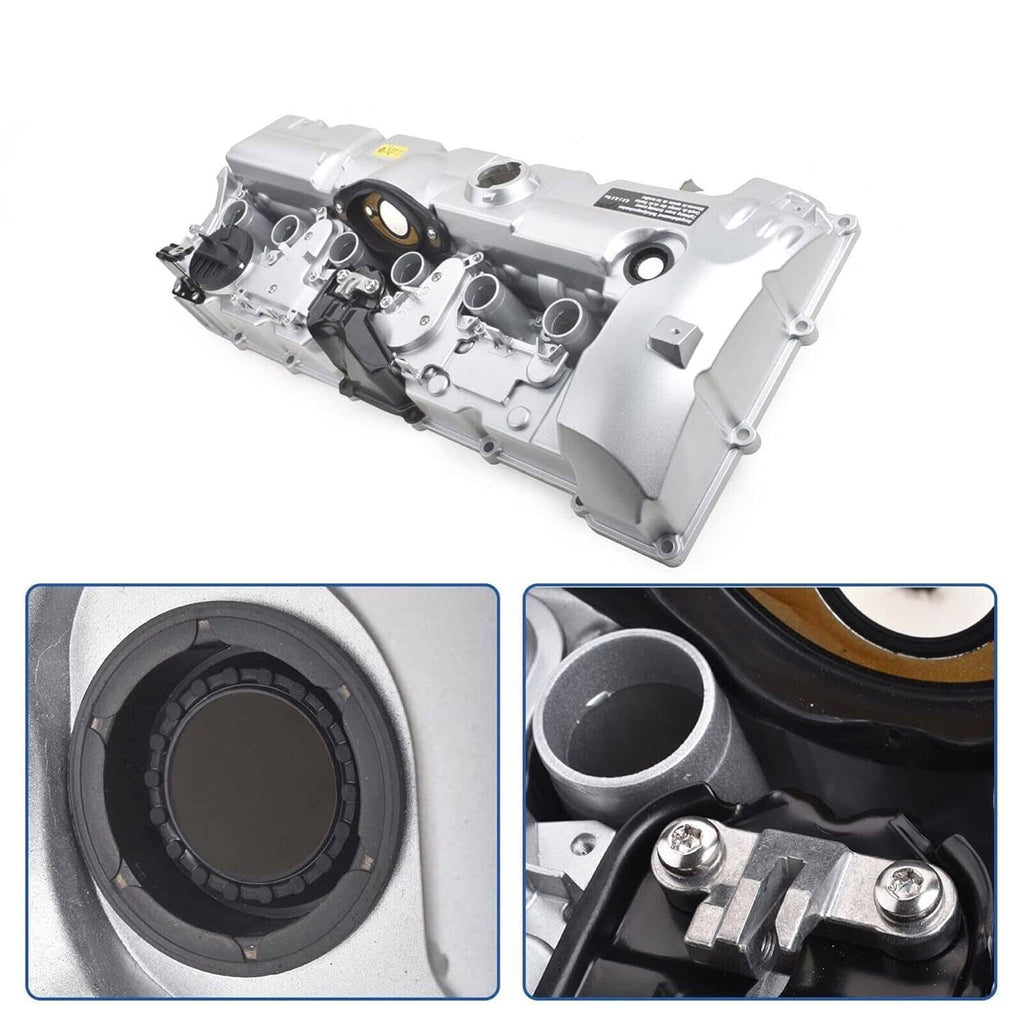 Silver aluminum engine valve cover with black cap and sensor openings, side view