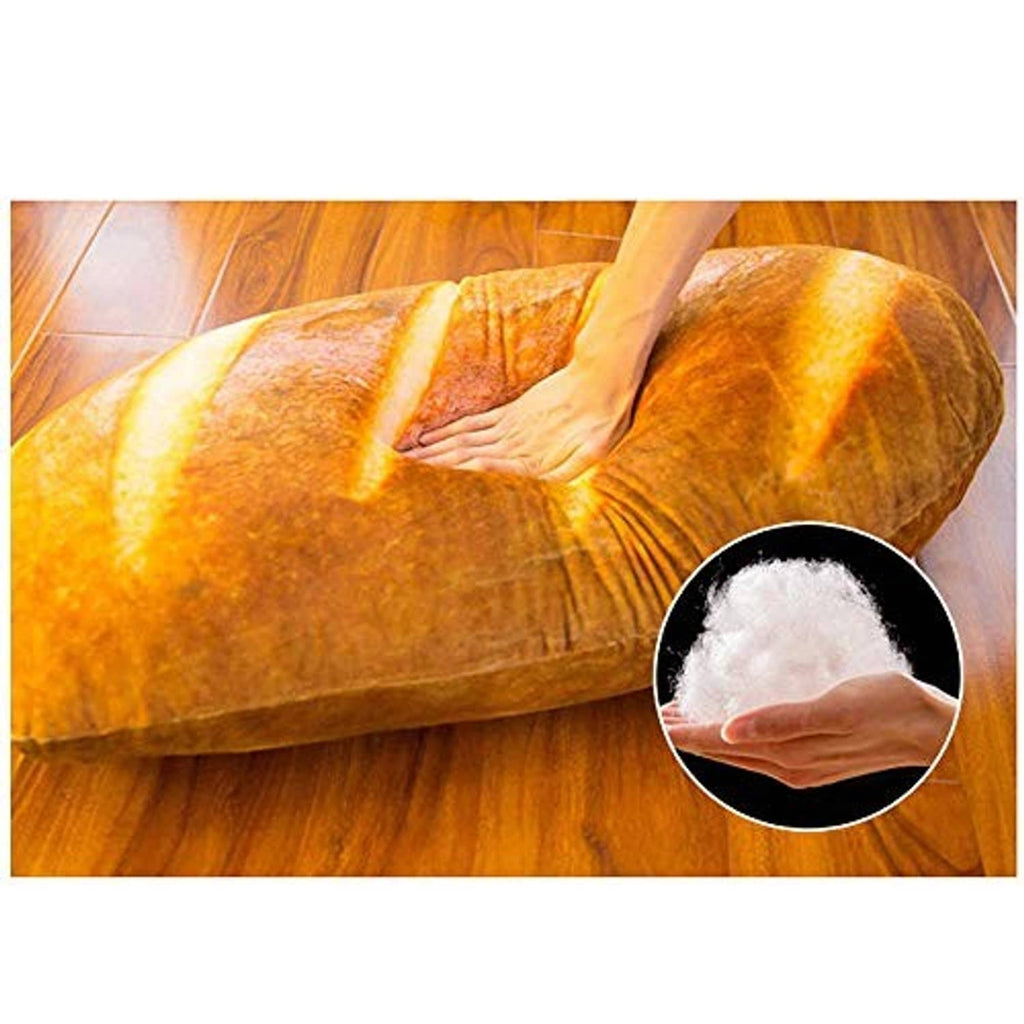 Loaf-shaped plush bread pillow with cream stripes; inset shows soft plush stuffing