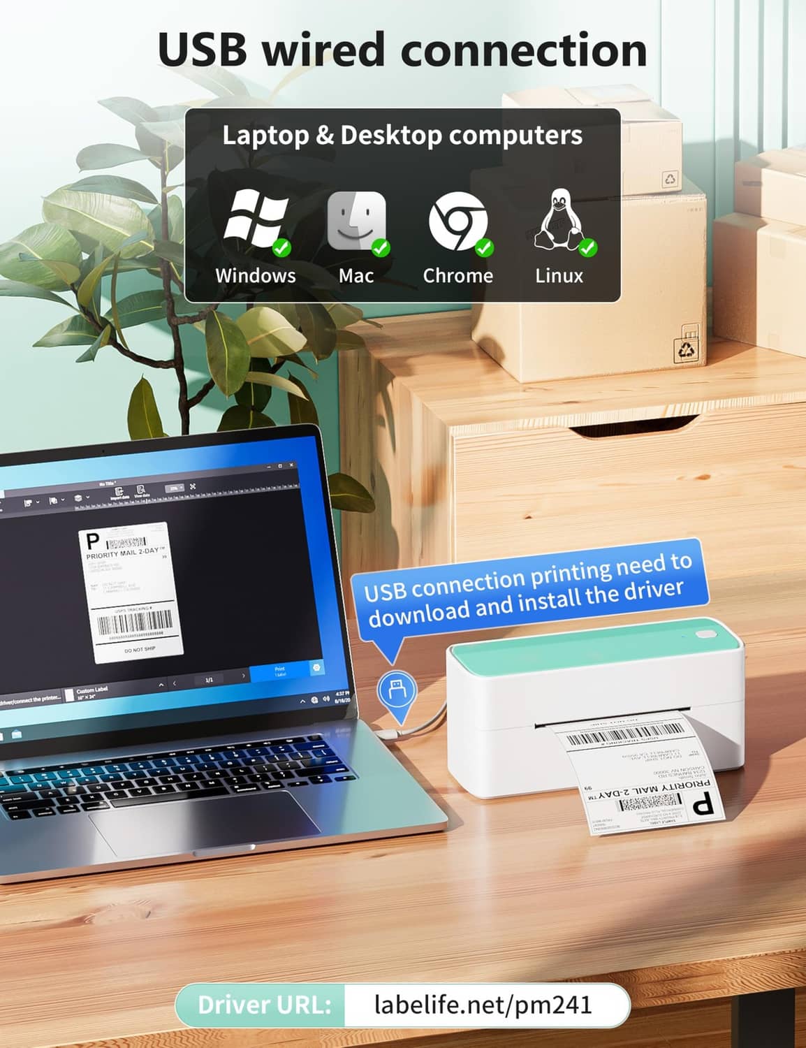 White USB thermal label printer with mint-green top near laptop and cables