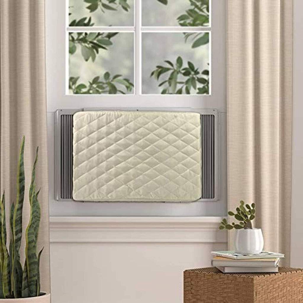 Cream quilted window AC cover installed on wall-mounted unit