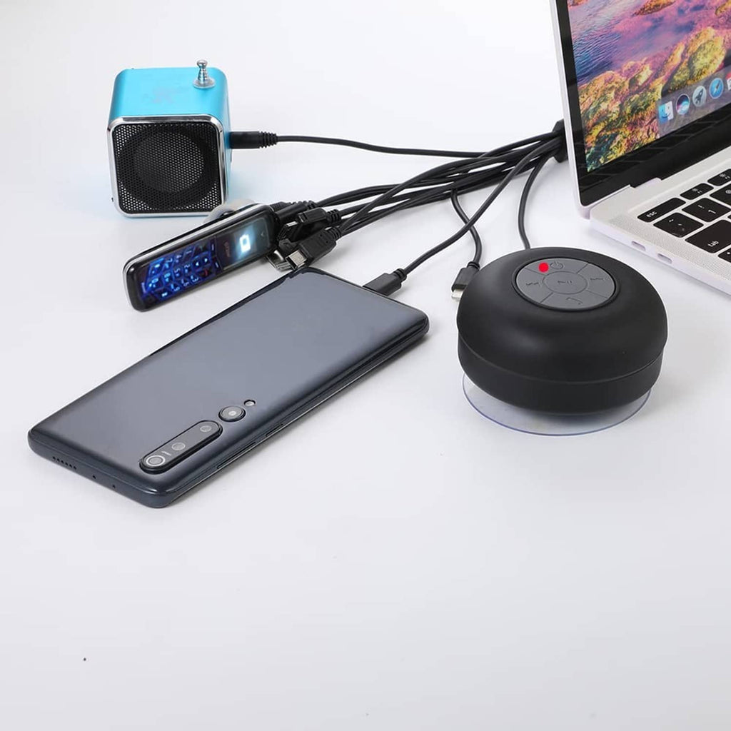 Black multi charging cable with multiple USB adapters connected to devices