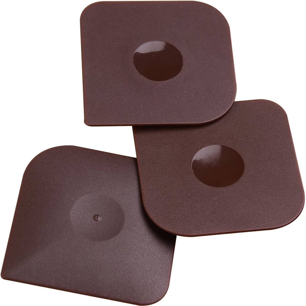 Brown plastic pan scraper set with three square pads and finger holes