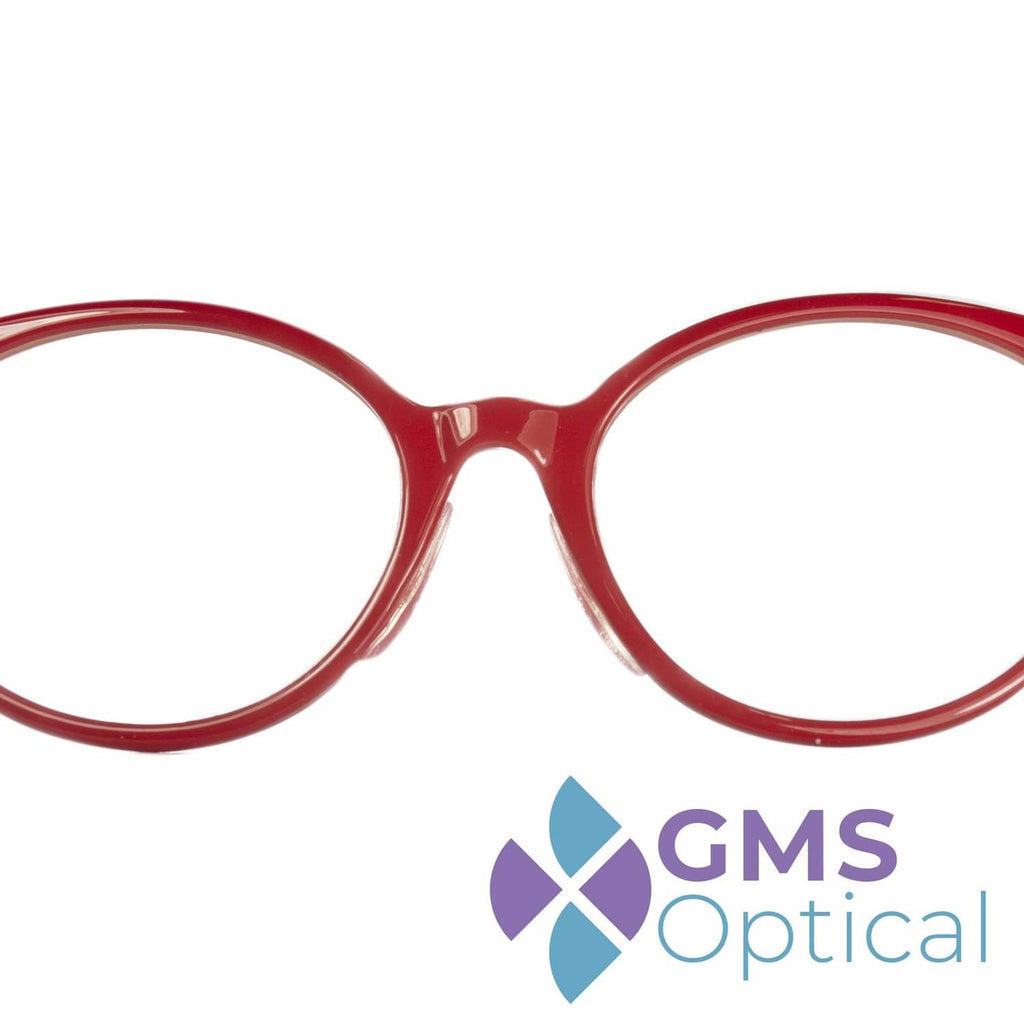 Red eyeglass frame with GMS Optical logo; nose pad kit branding
