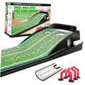 Indoor golf putting green mat with dual-hole cups on a black base and teal edge trim.