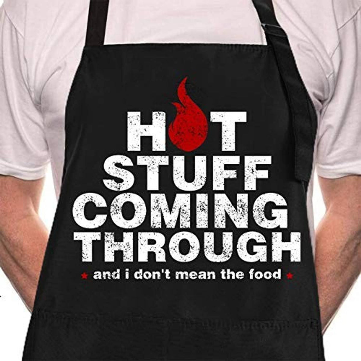 Black BBQ apron with “HOT STUFF COMING THROUGH” text, red flame icon, and footer line