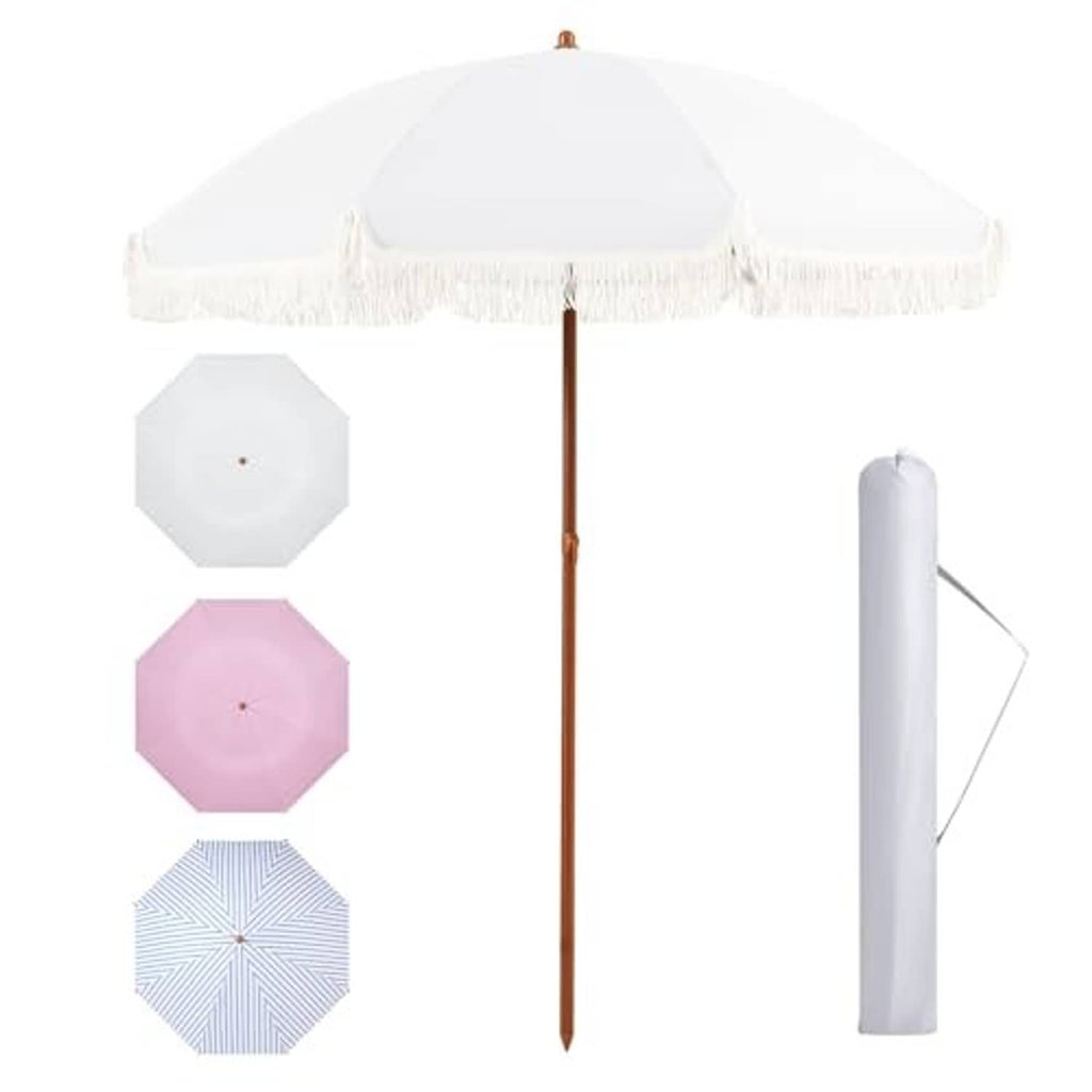 Cream patio umbrella with white fringe, storage cover, and fabric color samples