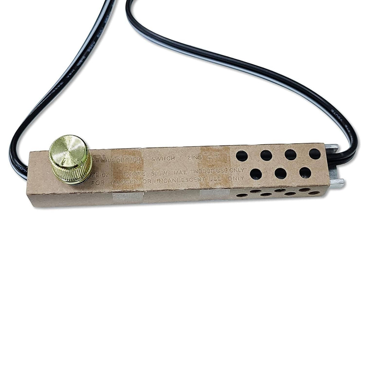 Rotary dimmer switch with gold knob, perforated board, and wire leads
