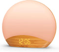 Wood grain sunrise alarm clock with glowing dome and digital time display