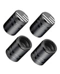 4-pack black aluminum tire valve stem caps with American flag top and textured grip
