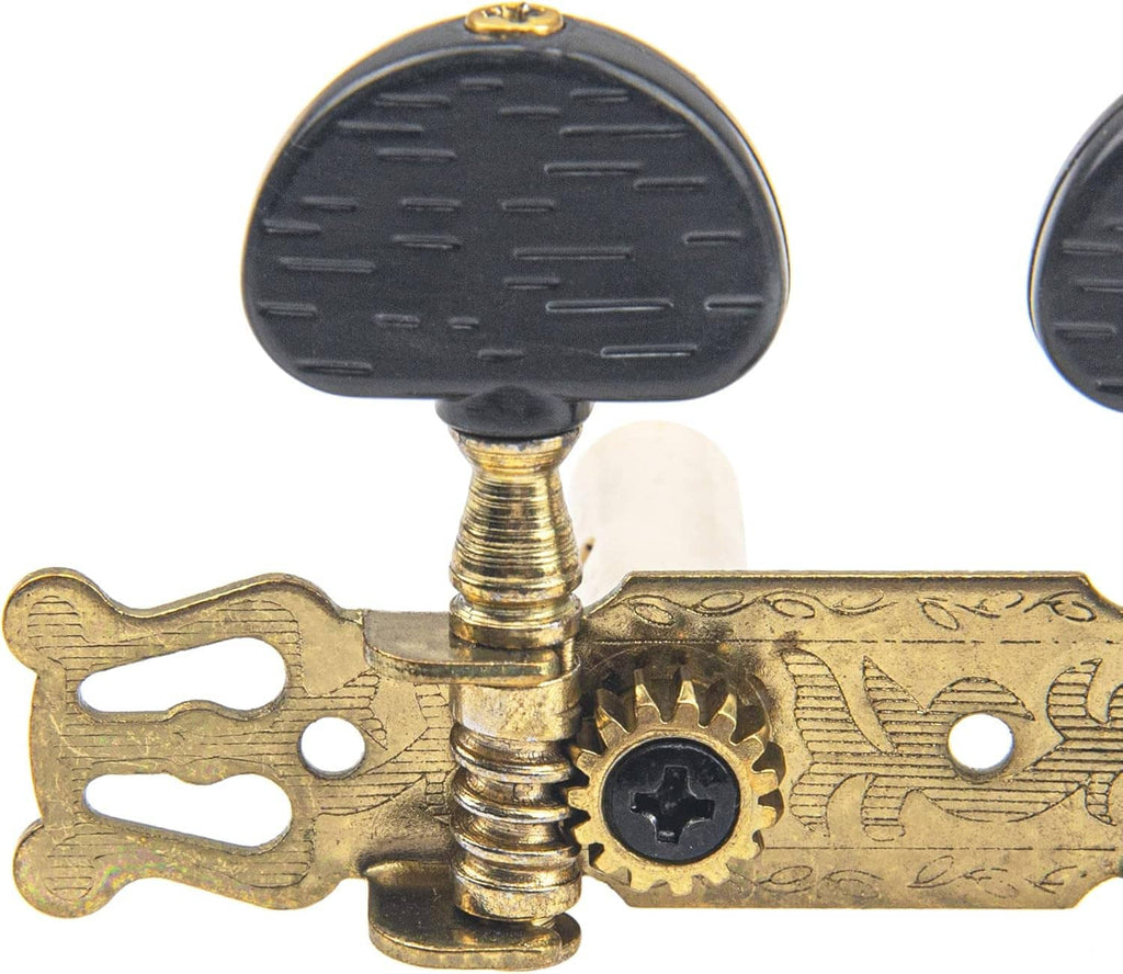Classical guitar tuning head with ornate gold plate and black tuning knob