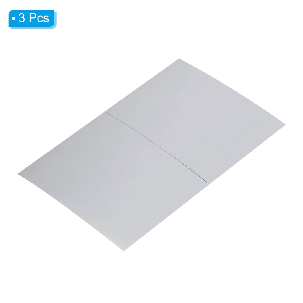 Adhesive polarizing film sheets, light gray, overlapping pieces with blue guide line