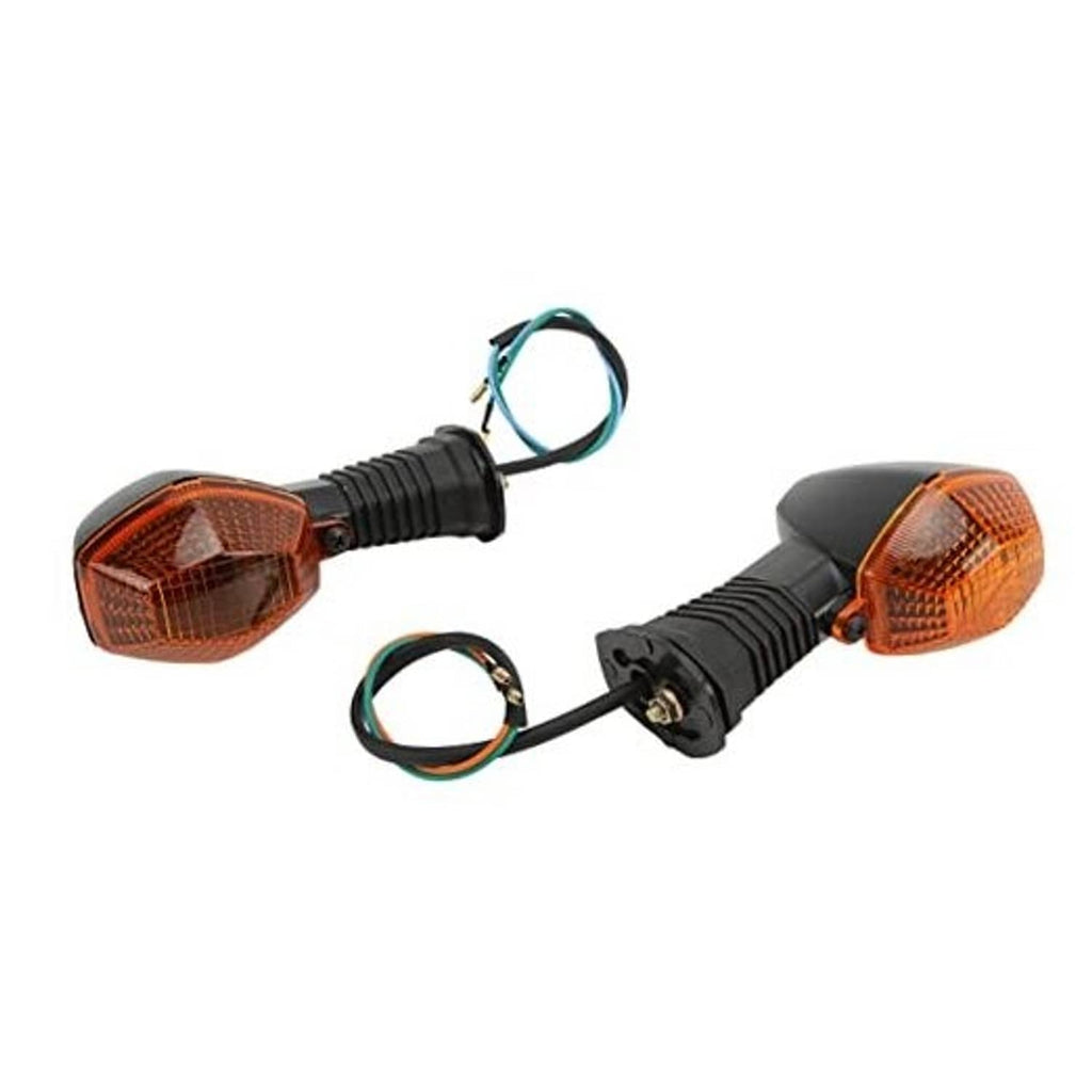Amber front motorcycle turn signal lamp with black housing and attached wire pigtail