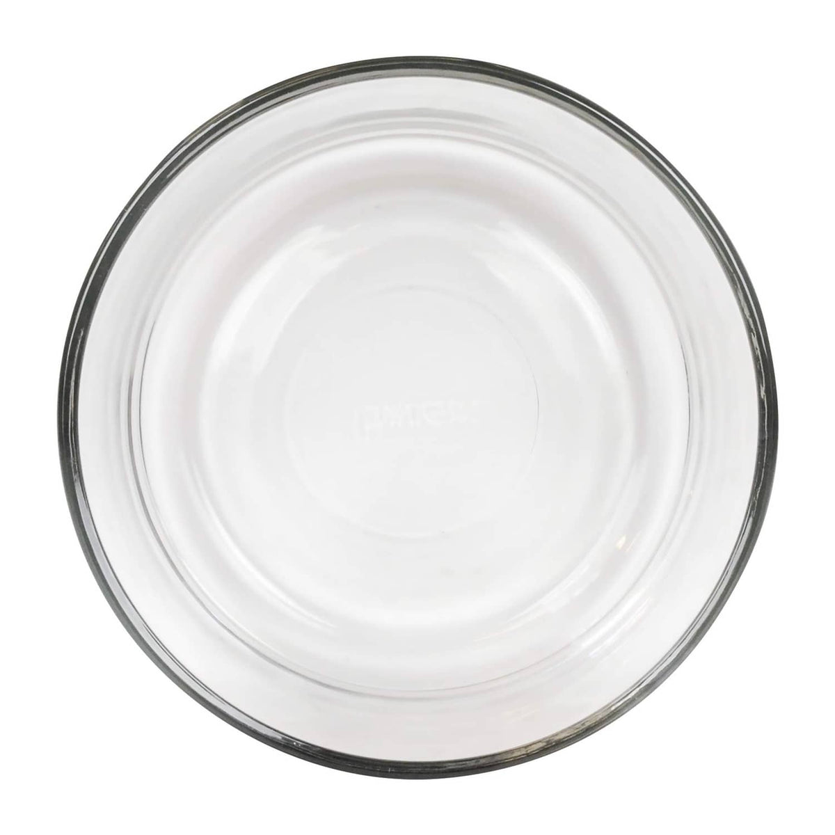 Pyrex clear 4-cup glass bowl top view, embossed base and dark edge rim