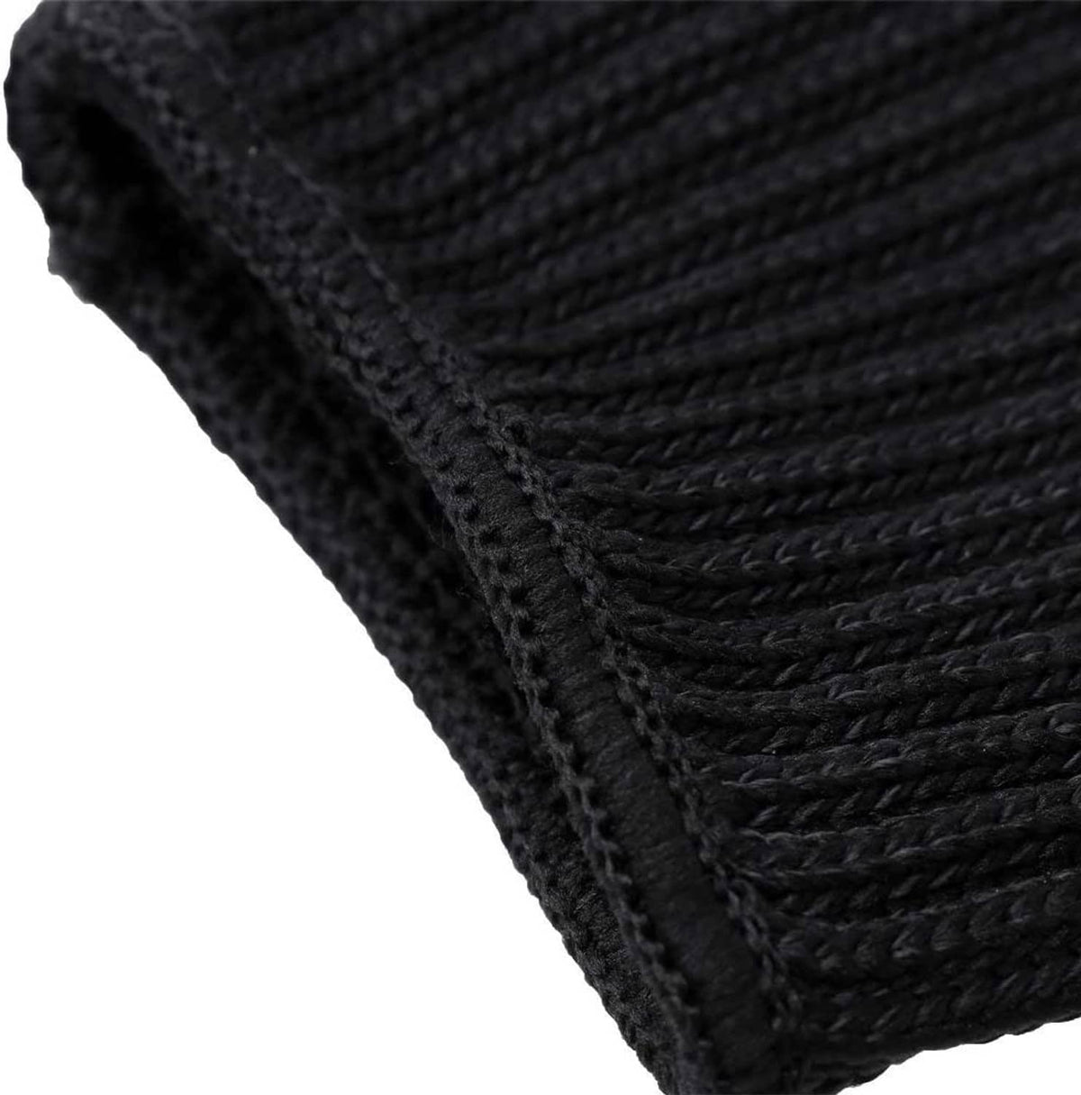 Black knit glove fabric seam detail with textured protective weave close-up